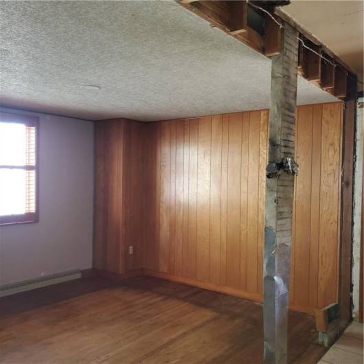 Dining room.   This wall between the dining room and kitchen has been removed create a more open floor plan.