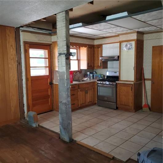 This is the vent and there is some wiring that needs to be covered with drywall to finish this area.