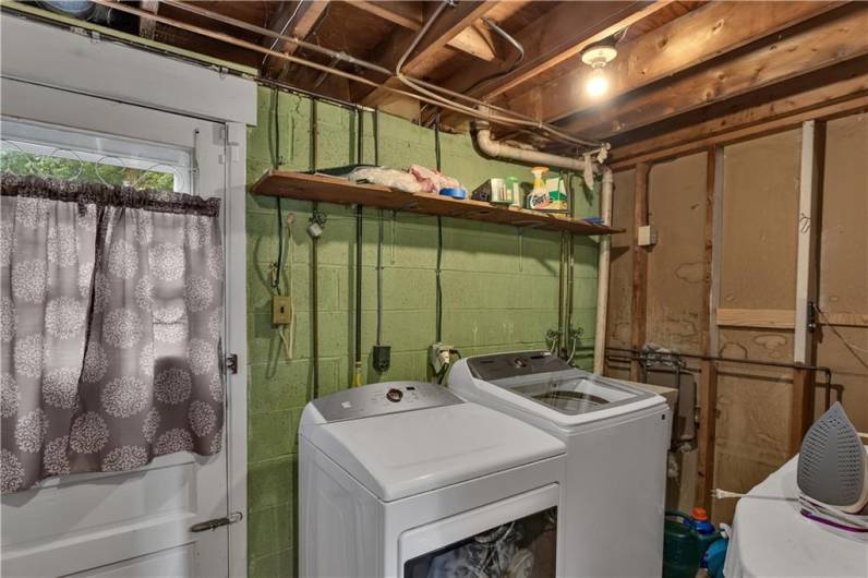 Walk out from laundry area to back yard