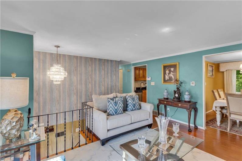 View of living room into formal dining room