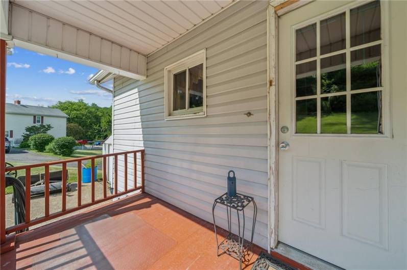 Main entry is accessed from back porch.