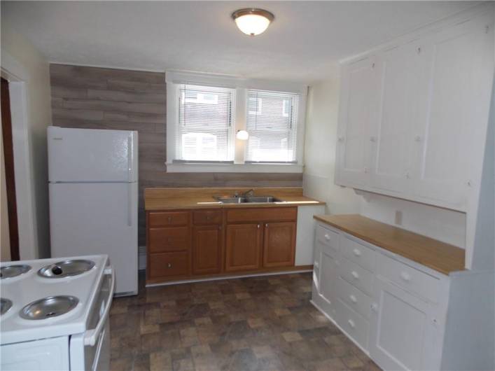 Small table will fit the space, in the center.