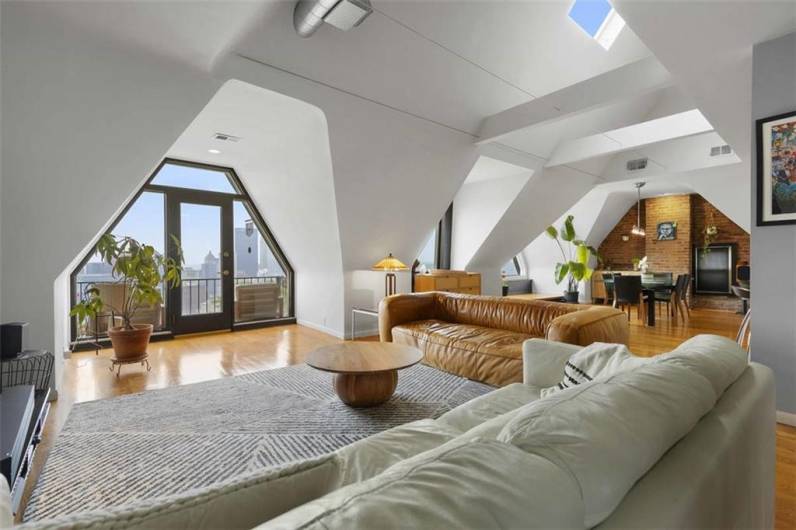 Plenty of seating to take in the view outside or the tv