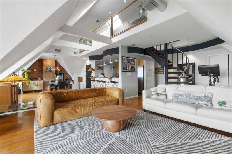 View of the living space and up to the loft