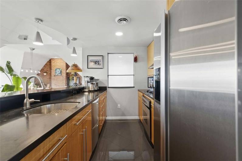 Galley kitchen with ample counter space
