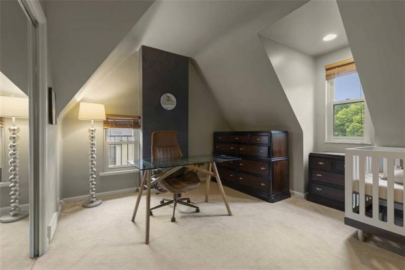 Primary bedroom on the main level. Currently used as an office.