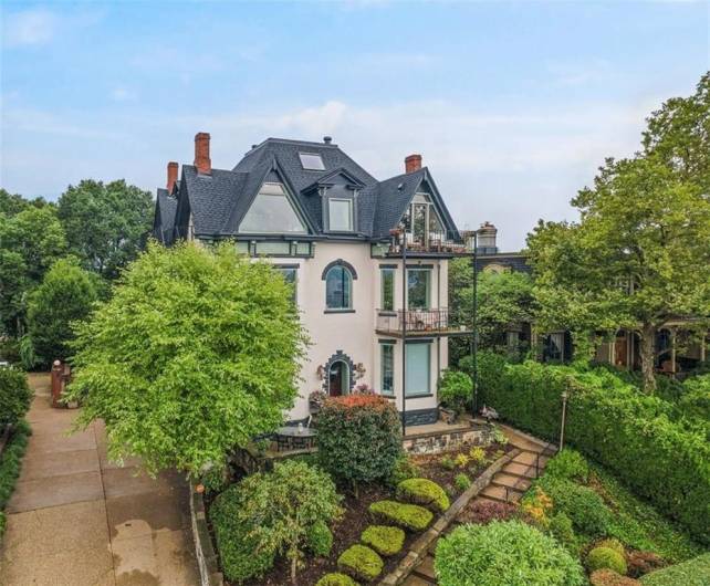 229 Grandview Avenue is comprised of three units. #3 is the penthouse and expands the top two floors.