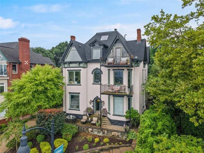 229 Grandview Ave boasts a freshly painted exterior, new roof and downspouts, updated windows, and landscaped grounds - all work included in the HOA fees.