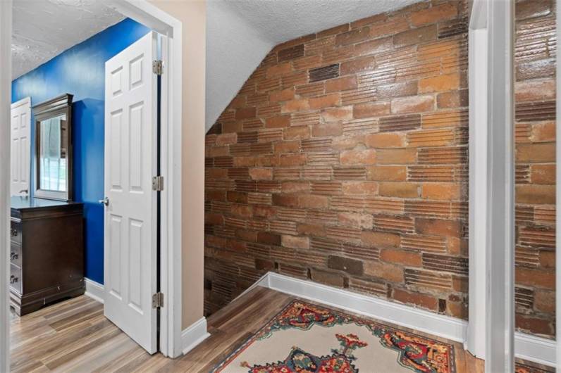 The view from the top of the stairs. Here you can see the colors and textures of the original terracotta bricks.