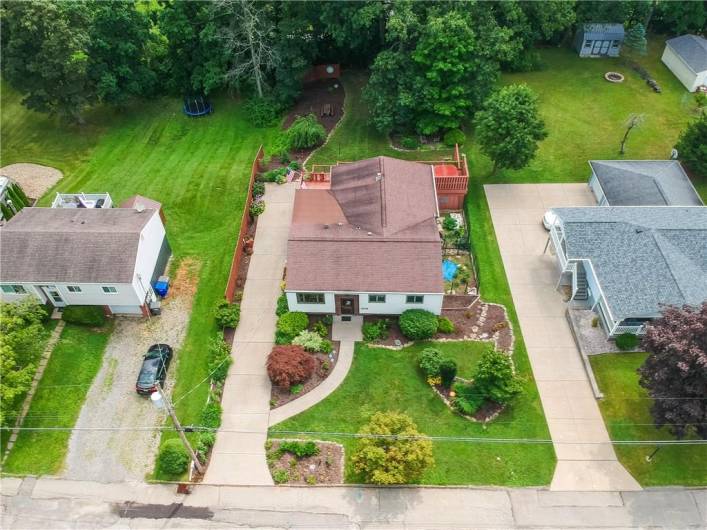 Situated on a generous lot with an expansive and private backyard, perfect for entertaining or relaxing in privacy. A spacious driveway, mature landscaping, and a large deck enhance the property’s impressive curb appeal and functionality.