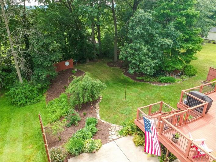 View of deck and backyard from above the trees.