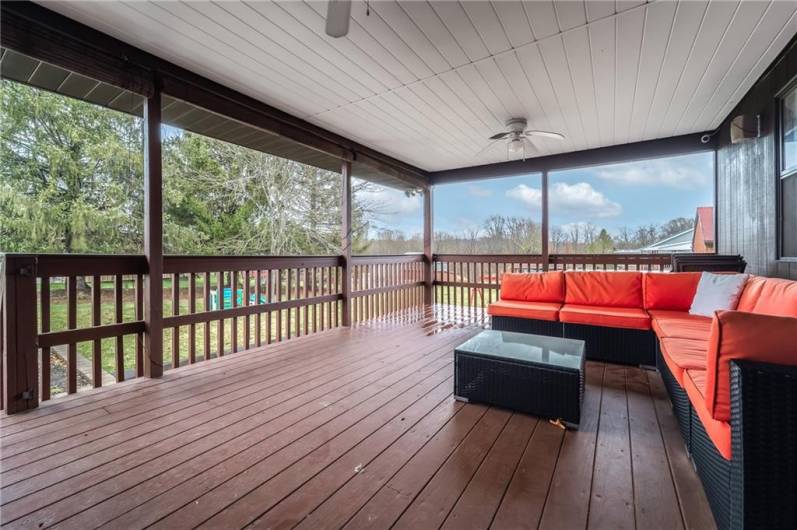 This covered deck is perfect three seasons of the year