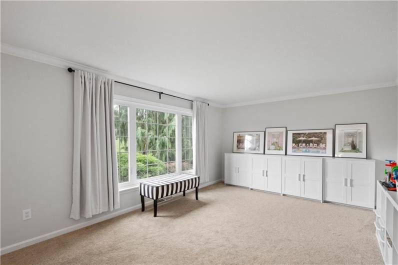 Bright and sunny with spacious wall space for furniture, art.