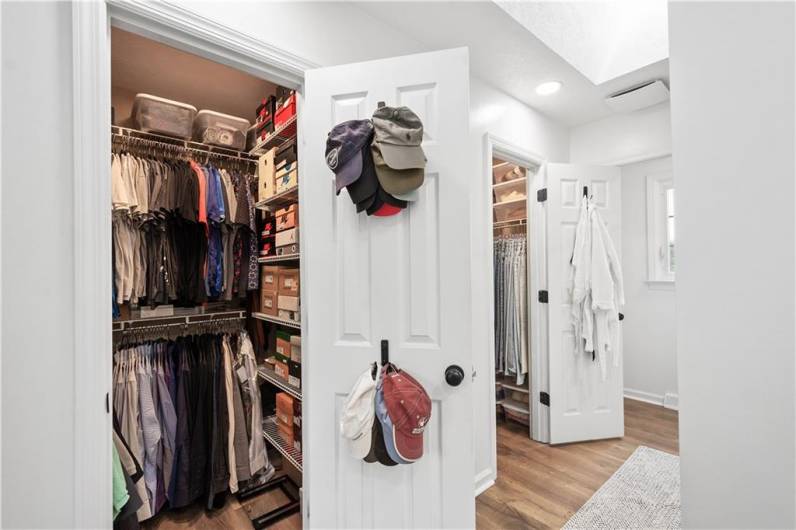 Generous his-and-her walk-in closets off the primary bedroom provide ample, organized storage for easy everyday use.