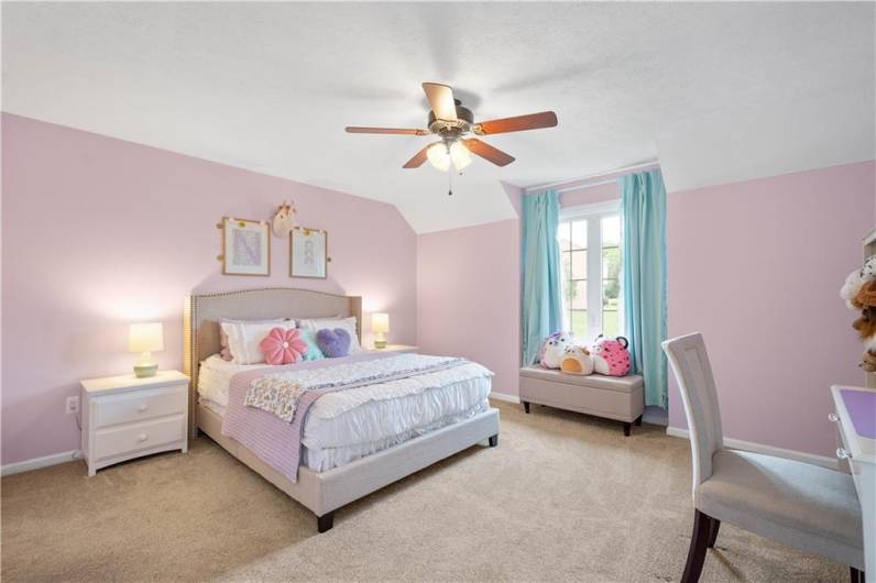 Bedroom two is bright and spacious, featuring neutral carpet and a large closet—perfect for comfort and storage.