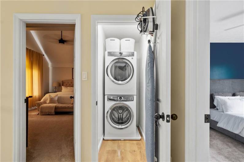 The laundry room has been relocated from the kitchen area to the second floor, offering added convenience and ease of use.