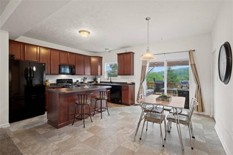 The open kitchen allows space to gather with family and friends.