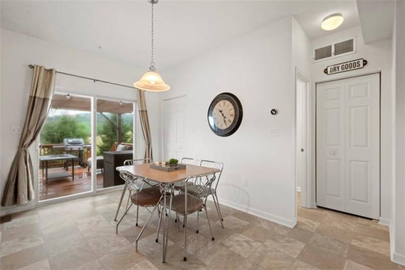 The dining area has an abundance of space that can easily fit an oversized kitchen or dining table.