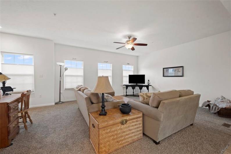 The wall of windows filters in ample daylight keeping this unit light and bright all day long.