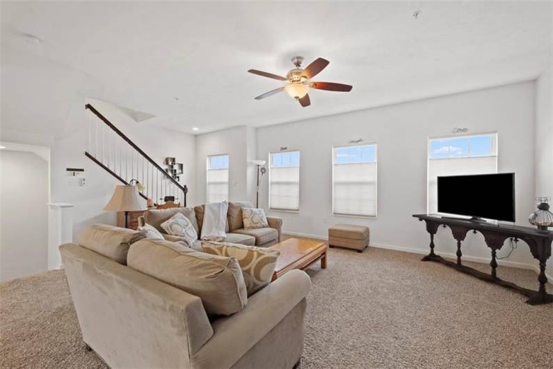 This large family room has endless possibilities for furniture placement and design options.