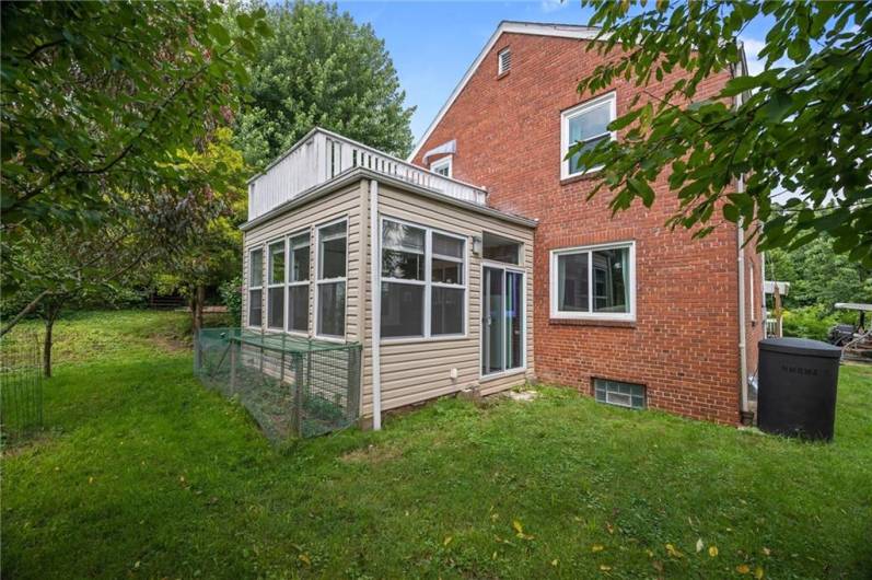 Exterior of the sunroom and the balcony above it