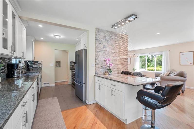 Open concept kitchen with tons of storage and granite countertops