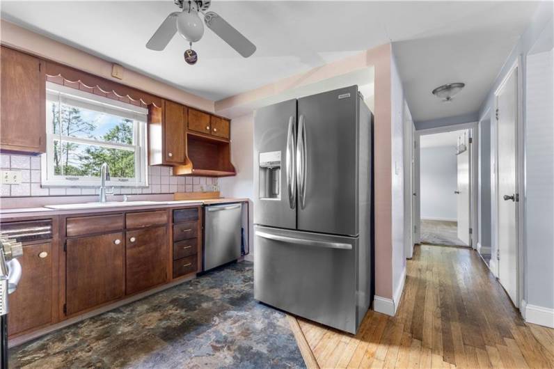 The window above the sink lets in lots of natural sunlight.