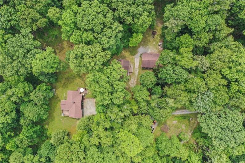 Overhead view, house on the left, bunkhouse and garage on the right. Paradise in the woods!