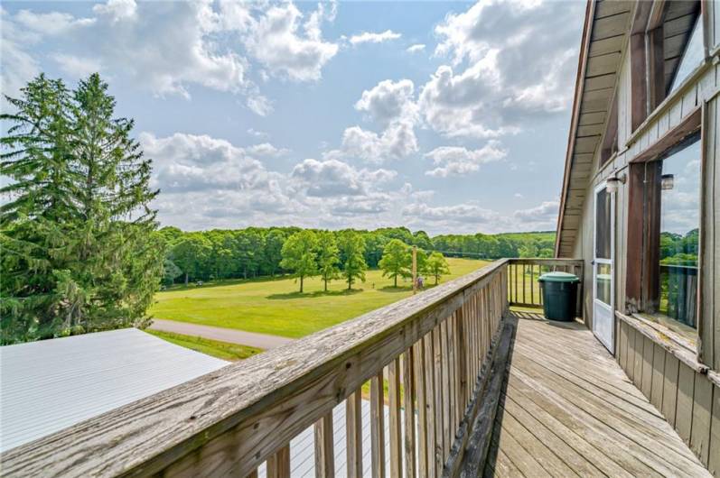 The deck offers beautiful views of the golf course.