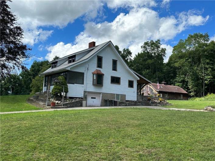 TOTAL RENOVATION: A cooking fire caused the home to burn down; it was totally REPLACED with this home in 1932, and it has now been totally RENOVATED & UPDATED; with final tweaks Septmber 2023! I car Integral Garage on this side.