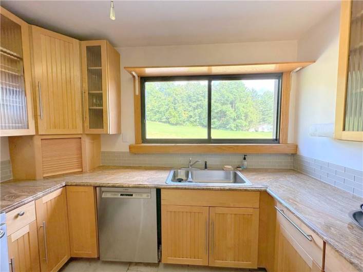 AMAZING  COUNTRY VIEW: this Kitchen window looks out to the east with privacy and an expansive pasture. This could be fenced, or could be gardens or the place for a detached garage or a fantastic pool and pool house.