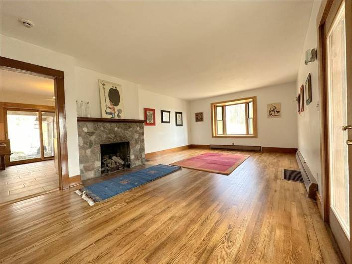 Without the virtual staging; the original solid Oak floorin was just refinished and is gorgeous!