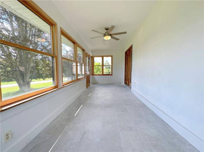 FOUR- SEASON 22'X8' ROOM: Here is the front room's empty (looking from the same angle as the staged Home Office photo), as it is now without staging so you can use your imagination for your uses.