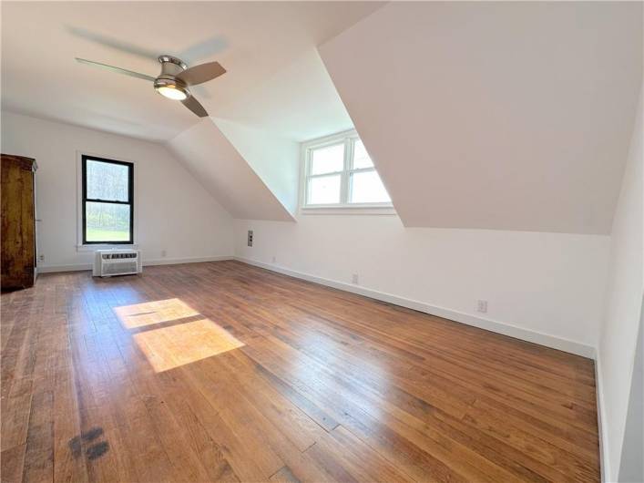 Just finished: Here is the 23'x13' room without the staging (looking from the same angle as the staged Master Bed Room photo), this is the original solid oak flooring from 1932; it was just refinished.