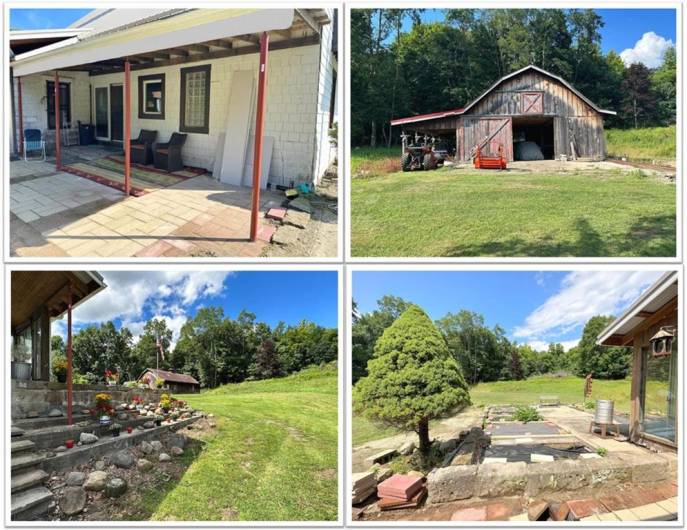 LOOKING NORTH from the back door: Great panoramas of the 10.3 acres, the large barn, the lean-to, the rock gardens and raised beds.